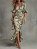 Anna - Asymmetrical long dress in green satin with V-neck, flared puff sleeves, and floral pattern