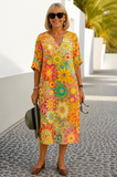 Nira | Vibrant Floral Midi Dress