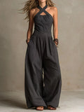 GIOVANNA | FLUID LONG JUMPSUIT WITH HALTER NECK